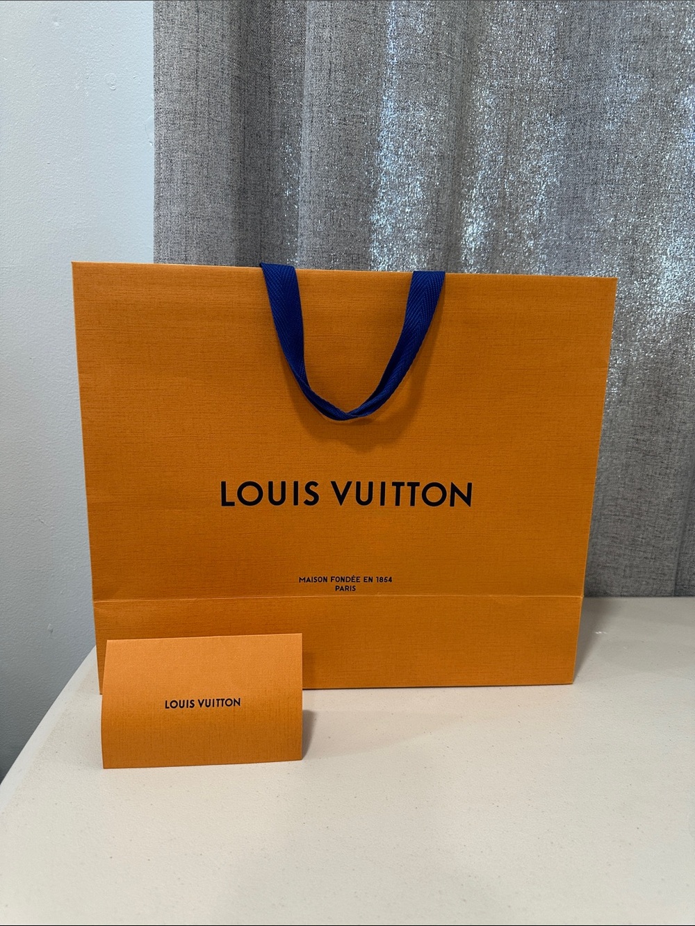Authentic Louis Vuitton Orange Gift Shopping Bag with Blue Ribbon Handles
